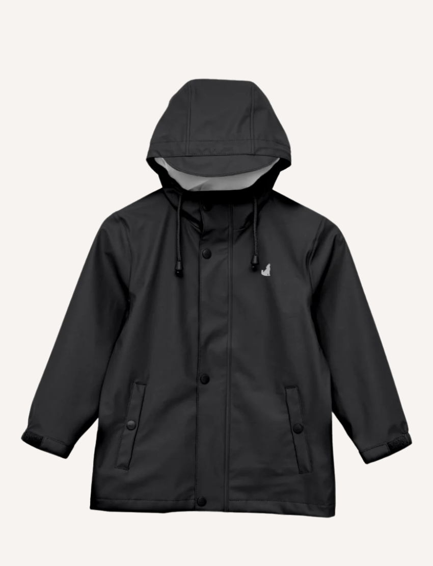 Front view of a black kids' hooded rain jacket with elastic cuffs, front pockets, and button closure.