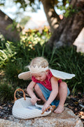 Two enchanting children's costume accessories from Fabelab: a captivating blue Moon Fairy Wand adorned with a crescent moon, star, and ribbon, and a delightful soft gold crown headband featuring star-shaped accents. Both items are beautifully showcased against a plain white background. The set is named the Moon Fairy Wand and Tiara set.