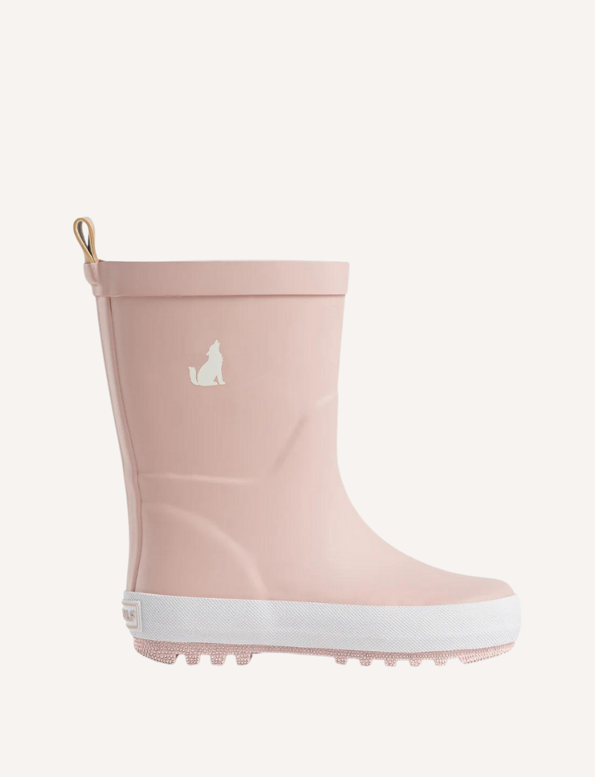 Cry Wolf's Rain Boots - Dusty Pink feature a small white dog silhouette on the side and convenient loop handles. They're crafted from natural rubber, with a white sole and textured grip pattern for secure footing.