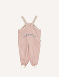 This image shows the back view of the Cry Wolf Rain Overalls in Dusty Pink, designed for children aged 3 years. The overalls feature elasticated cuffs at the ankles and adjustable shoulder straps with the brand's name printed on them. The words 