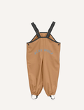 A pair of children's tan waterproof Rain Overalls from Cry Wolf with elasticated ankle cuffs, black adjustable shoulder straps, and the words 