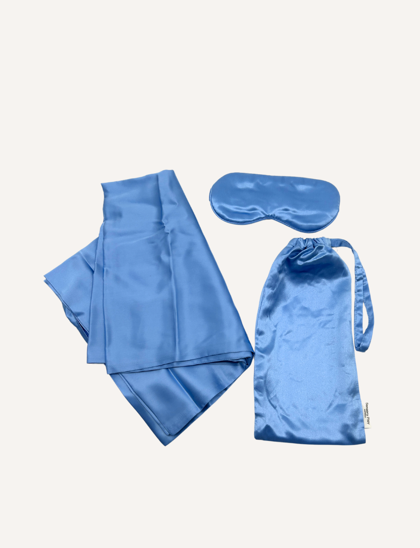 Sensory Play Australia's blue silk pillowcase and eye mask set for children, enhancing sleep quality and promoting self-care.