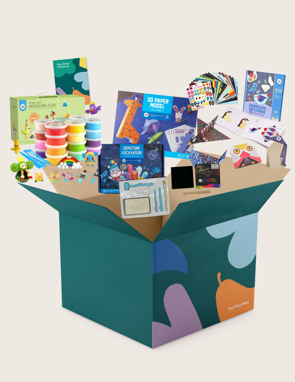 The Therapy At Home Fine Motor Advanced Program features a vibrant box with modeling clay, a 3D paper model kit, cards, stickers, markers, and more—ideal for building fine motor skills as recommended by occupational therapists.