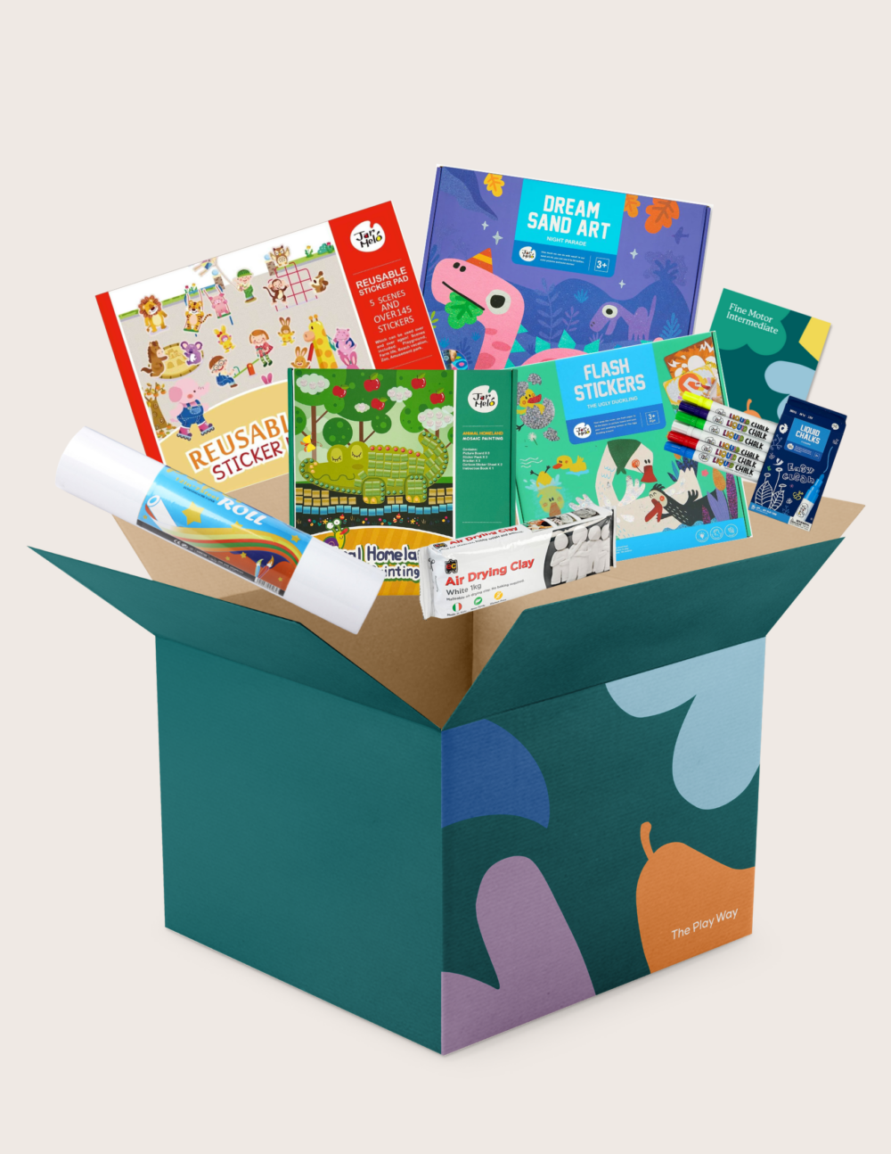 The Therapy At Home Fine Motor Intermediate Program is an open teal box with abstract designs featuring craft and activity sets to strengthen fine motor skills using reusable stickers, sand art, air-dry clay, glue, and storybooks.