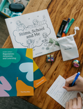 The Regulation: Attention and Learning Program by Therapy At Home is an open teal box packed with sensory and educational tools, including 