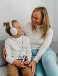 The Regulation: Discovering your Calm Program by Therapy At Home features a teal box with colorful shapes, a blue bag, children’s book, regulation cards, yellow ball, toy phone, pacifiers, bottle nipples, and gray pacifier holder on a light background.