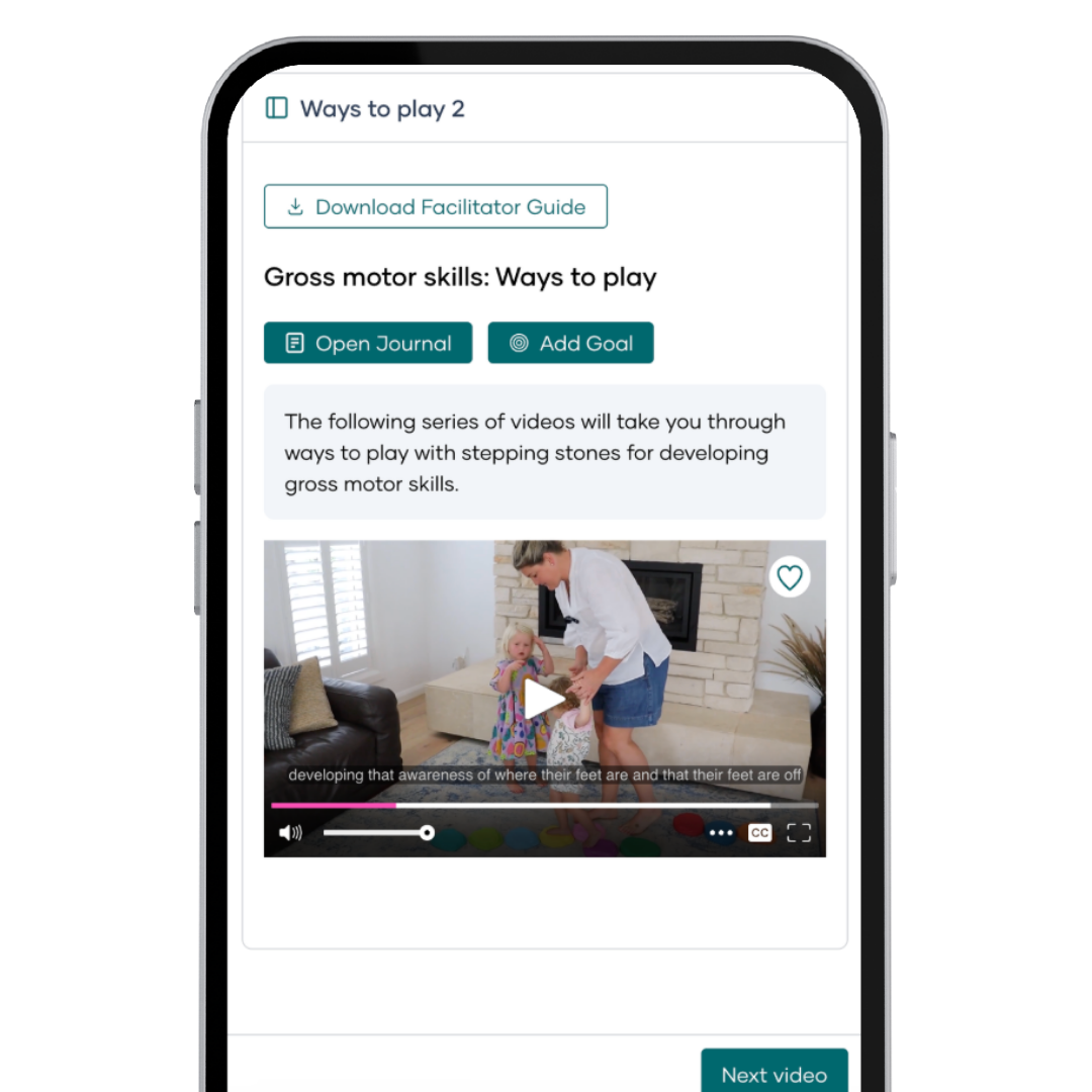 Phone screen displaying a video tutorial on gross motor skills development with a woman and child.