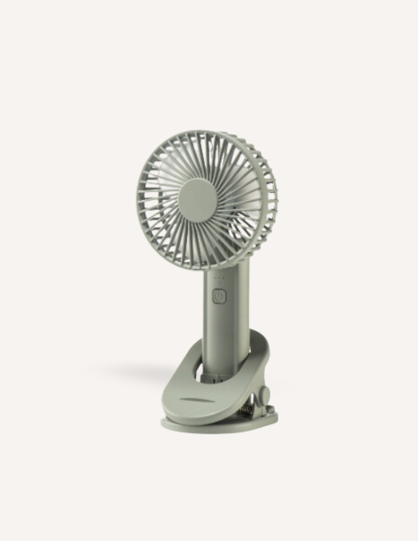 The Play Way Sleep Fan: Grey portable clip-on fan with rechargeable battery, ideal for soothing white noise and restful sleep.